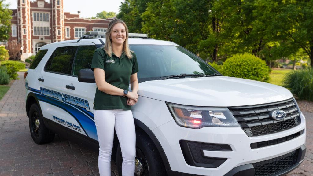 Alum in front of vehicle